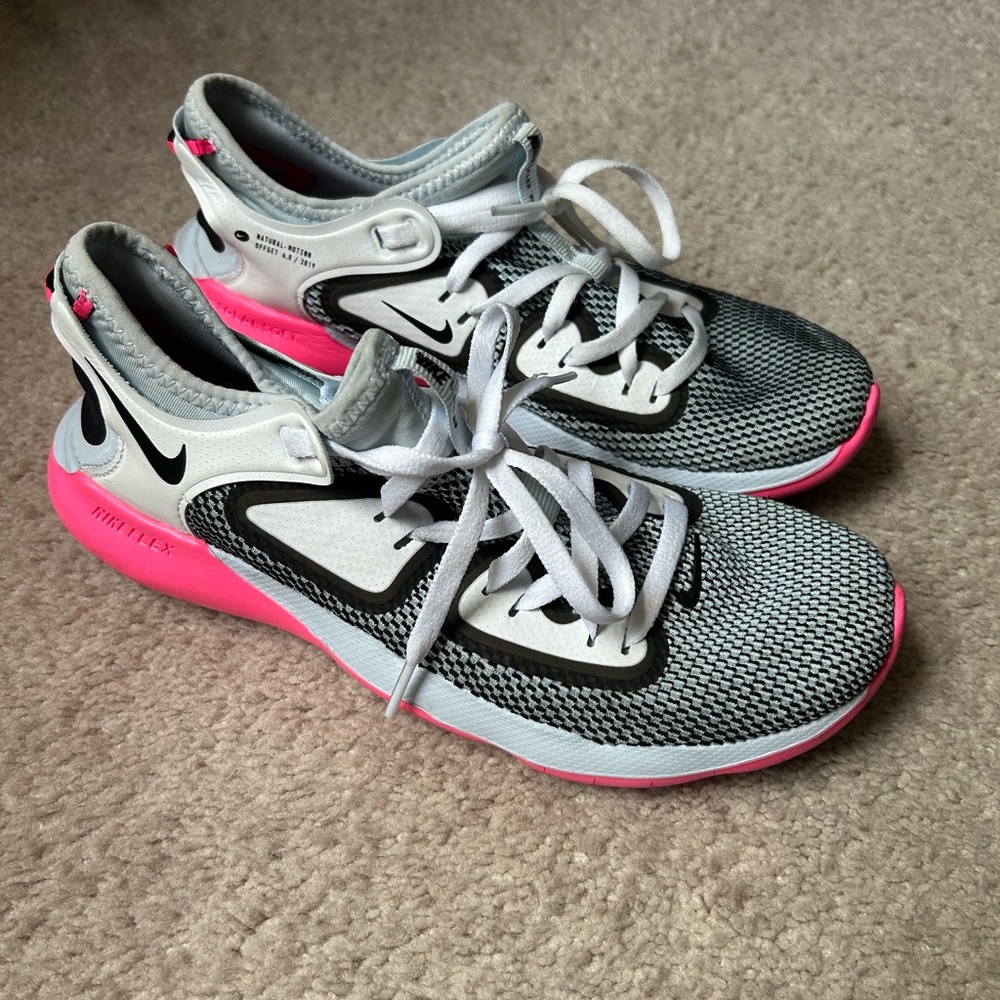 Nike Black and Pink Athletic Shoes with Modern Design